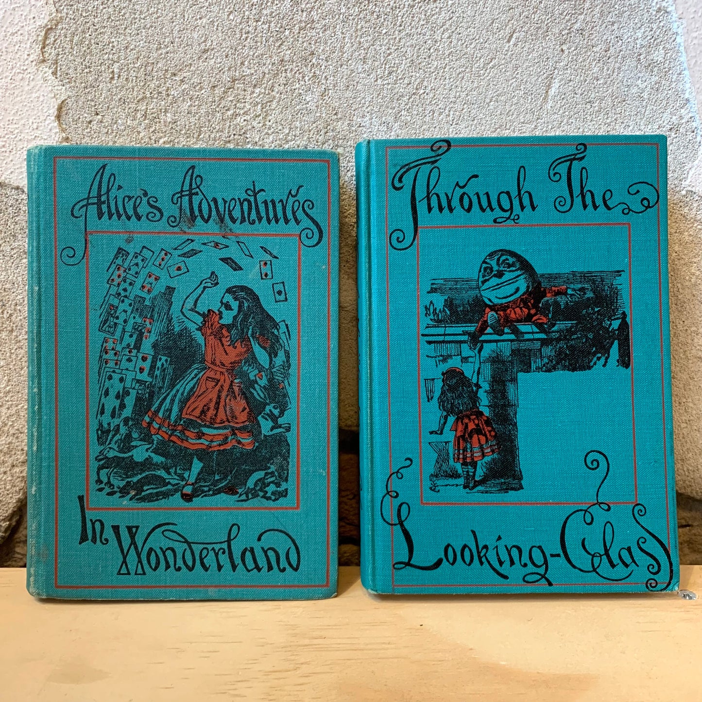 Alice's Adventures in Wonderland and Through the Looking Glass – Lewis Carroll